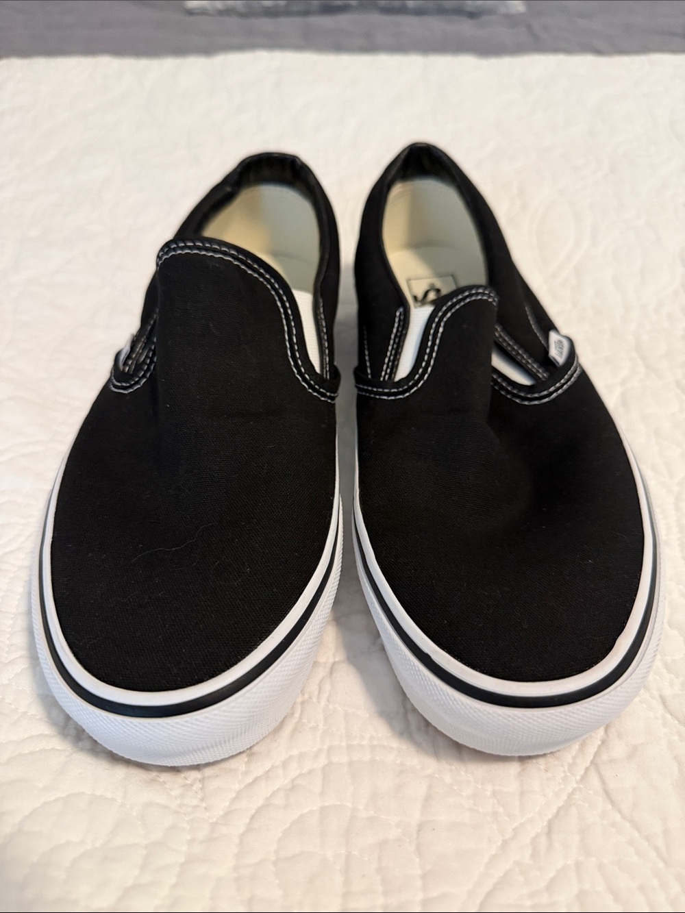 Vans Black Slip-On Canvas Sneakers with White Sole